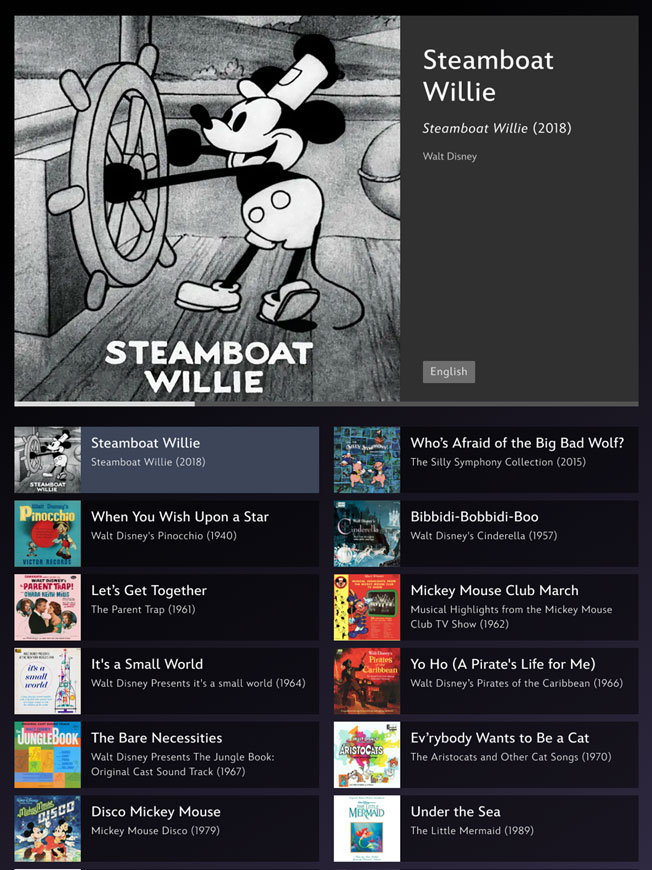 Touchscreen-Oberfläche der interaktiven Jukebox in der Disney 100 Ausstellung mit Songauswahl klassischer Disney-Filme – Medienkonzept und Interface-Design von cocurio